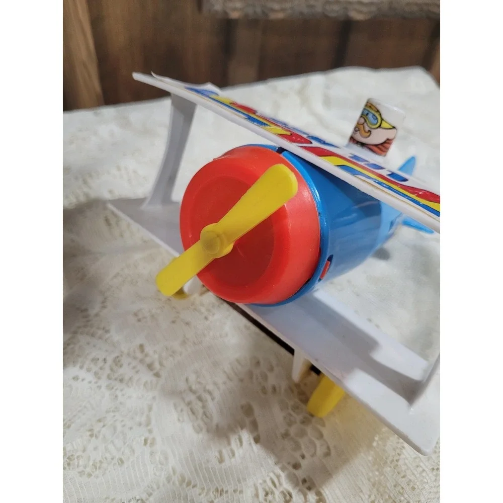 LIL ACE plastic airplane toy 1970s psychedelic stunt biplane w/ mustache man